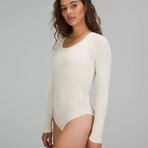 Lululemon Bodysuit Cream 
Size large